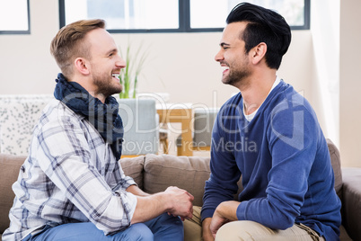 Gay couple laughing together