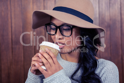 Asian woman drinking by disposable cup