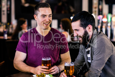 Friends having a pint