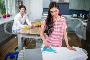 Brunette ironing