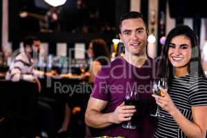 Portrait of couple having a glass of wine