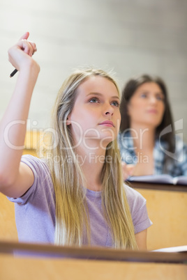 Students sitting beside each other while learning