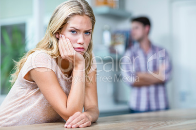 Annoyed couple ignoring each other