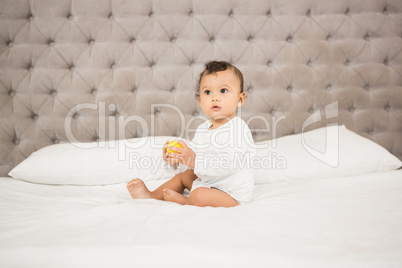 Cute baby playing with ball