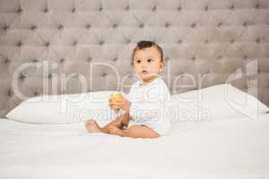 Cute baby playing with ball