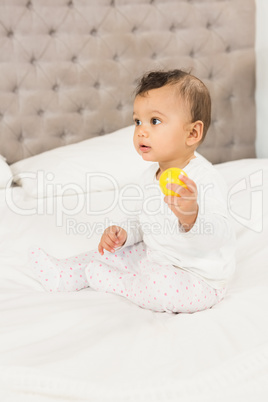 Cute baby playing with ball