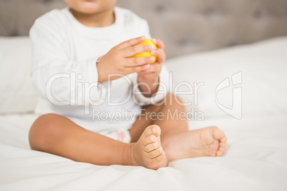 Cute baby playing with ball