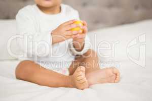 Cute baby playing with ball