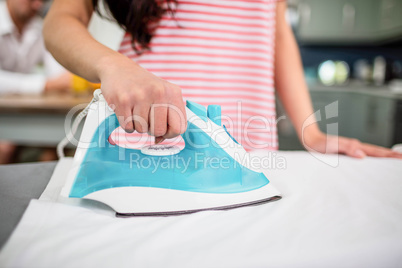 Brunette ironing