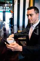 Businessman having a coffee