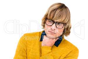 Portrait of thoughtful hipster businessman with hand on chin