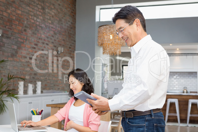 Happy man using tablet