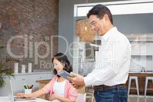 Happy man using tablet