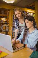 Serious students using laptop