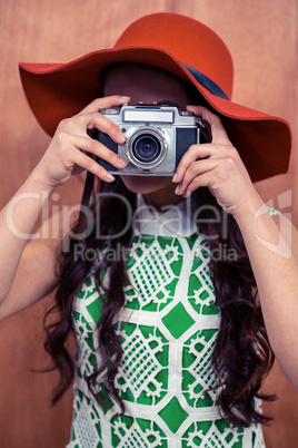 Woman taking photograph with camera
