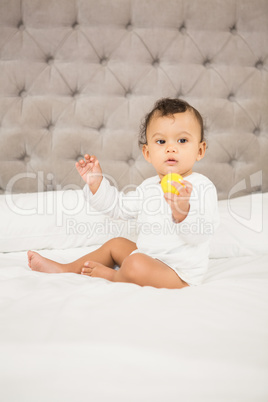 Cute baby playing with ball