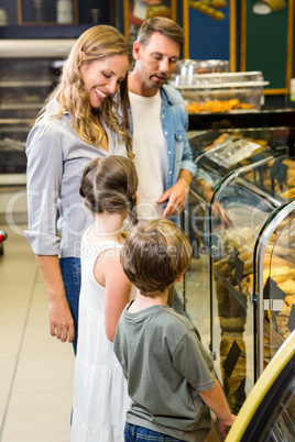 Happy family looking at bread