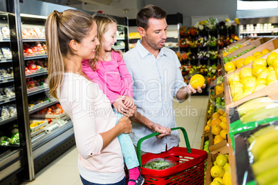 Happy family doing shopping