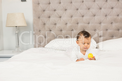 Cute baby playing with ball