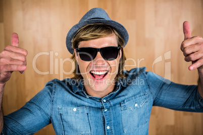 Cheerful hipster wearing sunglasses