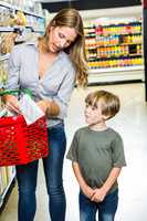 Mother and son reading shopping list