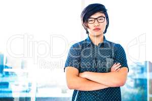 Hipster businessman with crossed arms