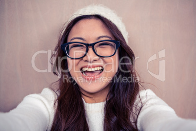 Asian woman smiling at the camera