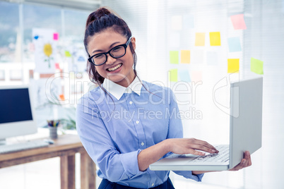 Asian woman using laptop