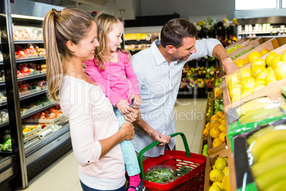 Happy family doing shopping