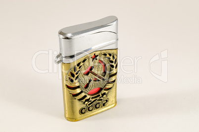 Gas lighter with emblem