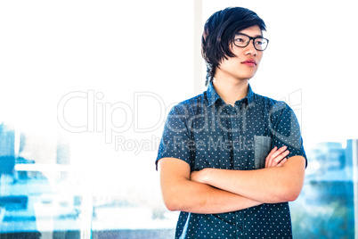 Thought hipster businessman looking away
