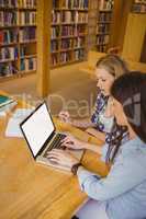 Serious students using laptop