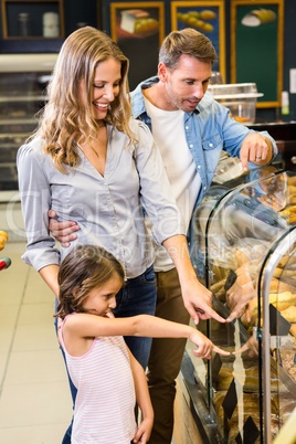 Happy family looking at bread