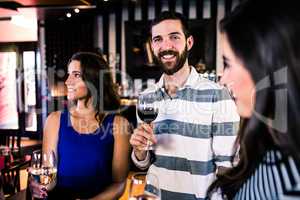 Friends having a glass of wine