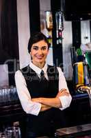Portrait of waitress behind the counter