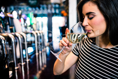 Pretty woman drinking wine