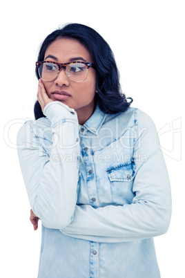 Thoughtful Asian woman with hand on chin