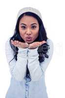 Asian woman blowing kiss to the camera