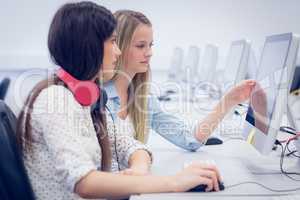 Concentrated students using computer