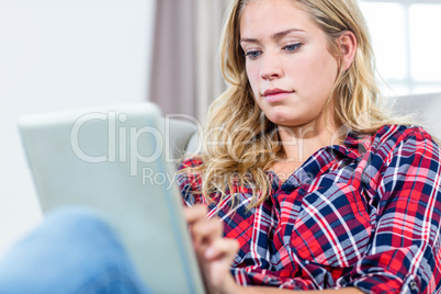 Woman using tablet computer