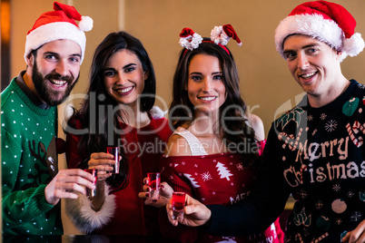 Festive friends having shots