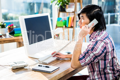 Hipster businessman having a phone call