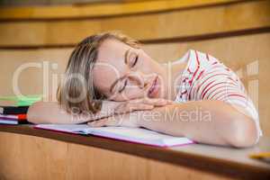 Female student sleeping in class