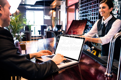 Businessman using laptop