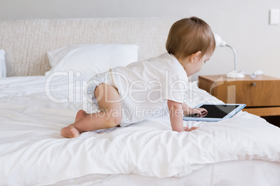 Cute baby using tablet