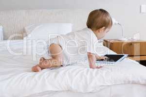 Cute baby using tablet