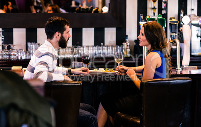 Couple having a glass of wine