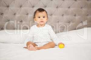 Cute baby playing with ball