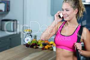 Fit girl calling someone