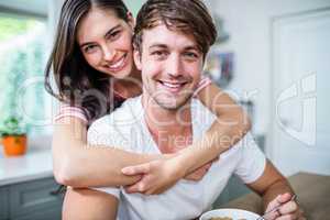 Happy couple in kitchen